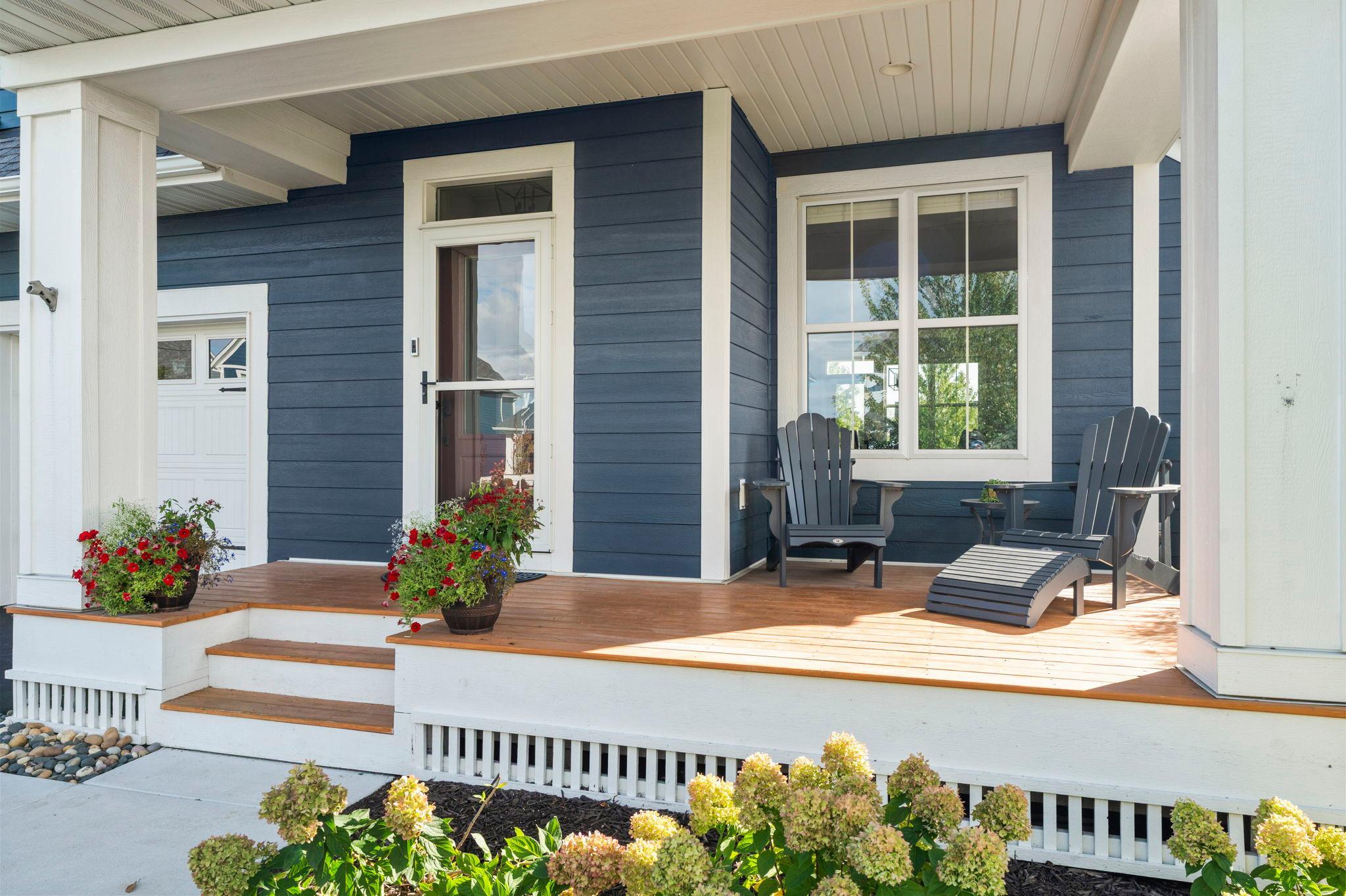The covered front porch adds a welcoming place to enjoy a quiet morning or unwind at the end of the day.