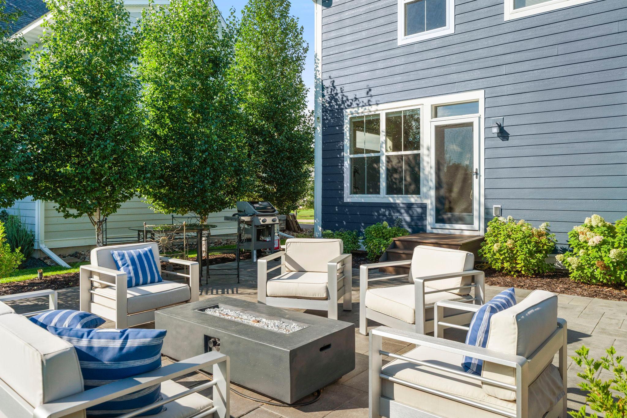 The backyard paver patio is conveniently located off the informal dining and kitchen. Making it a breeze to grill or entertain.