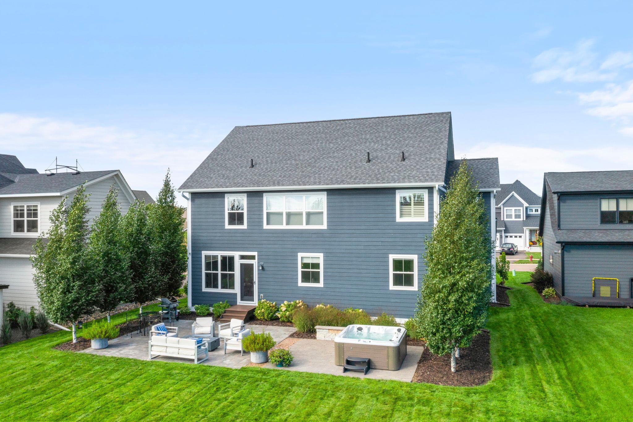 Aerial view of the backyard patio and hot tub.