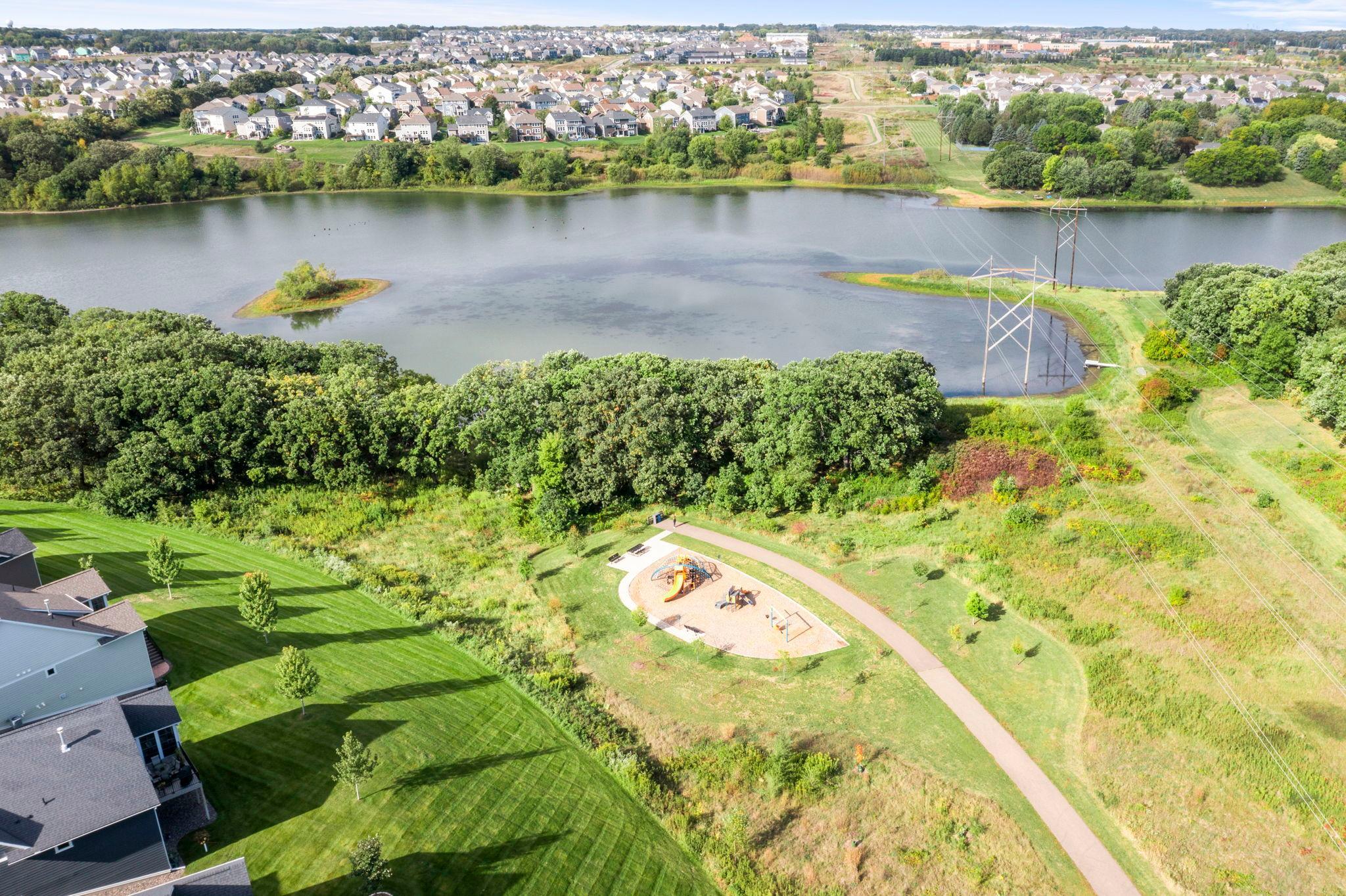 Aerial view of a path that leads to Bailey Lake and a playground.