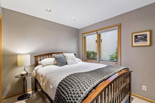 Retreat to this cozy bedroom on the lower level.