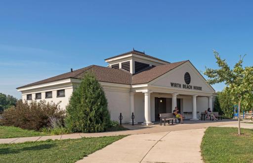 Theo Wirth Beach - A sandy lakeside beach perfect for swimming, paddleboarding, kayaking, picnics, and enjoying warm Minnesota summer days close to home.