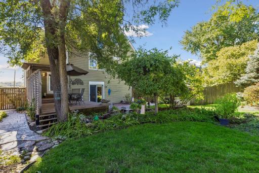 The beautiful and open green space create a peaceful setting for entertaining, family activities, or enjoying Minnesota's seasons.