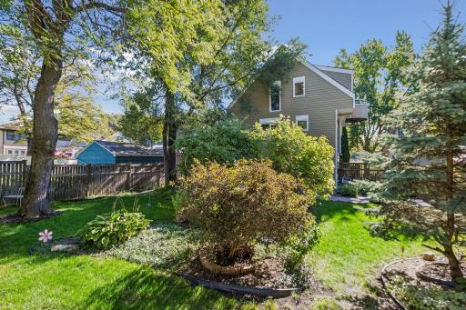 The beautiful and open green space create a peaceful setting for entertaining, family activities, or enjoying Minnesota's seasons.