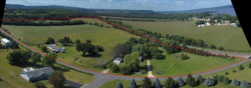 The red line should follow the corn and not include the two homes near the railroad tracks