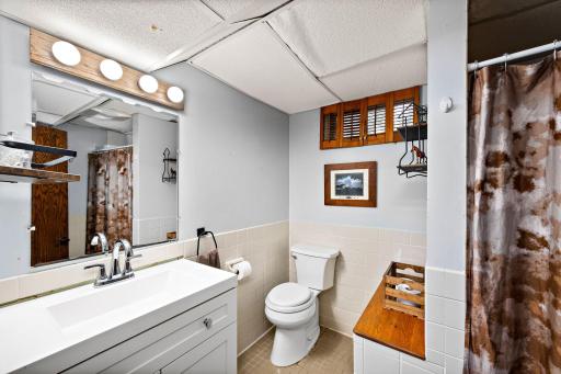 3/4 bath with tile flooring in lower level