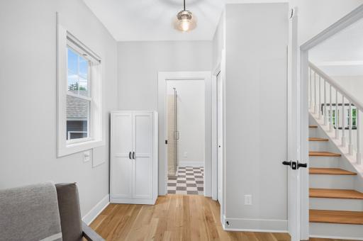 The primary suite is equipped with rough-ins for a Miele washer & heat pump dryer, offering the convenience of all living facilities on the main level.