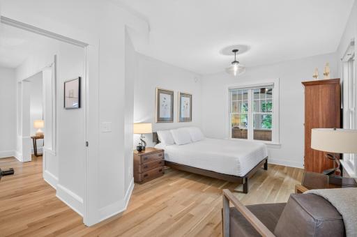 Thoughtfully designed main-level primary suite offers a peaceful retreat to relax and unwind.