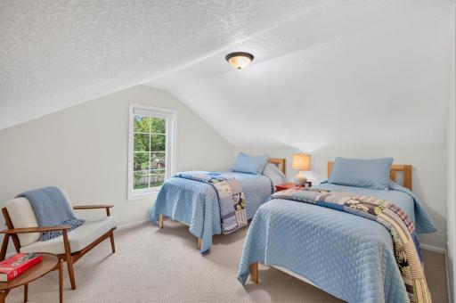 Upper level bedroom complete with walk-in closet.