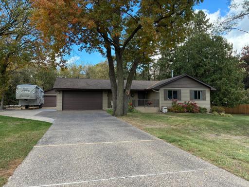Notice the expansive concrete driveway with plenty of room for a camper, boat, or additional vehicles