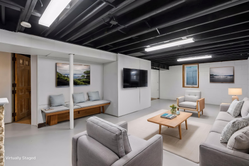 Whether it’s game night, movie night, a home office, workout area, or hobby space, the lower-level offers flexible space to make it your own. Virtually staged.