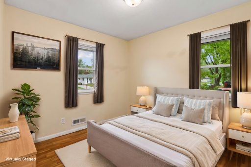 The thoughtful layout gives you two bedrooms on the main level plus a third bedroom added downstairs in 2026, offering flexibility for family, guests, or a space that grows with your needs. Virtually staged.