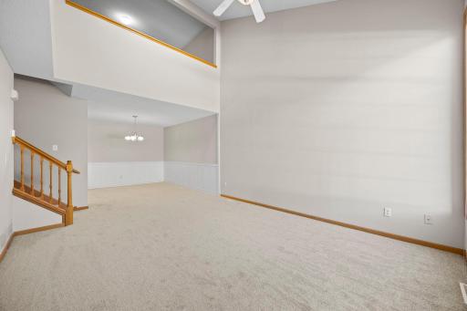 Brand-new carpeting adds a fresh feel to the inviting main level.
