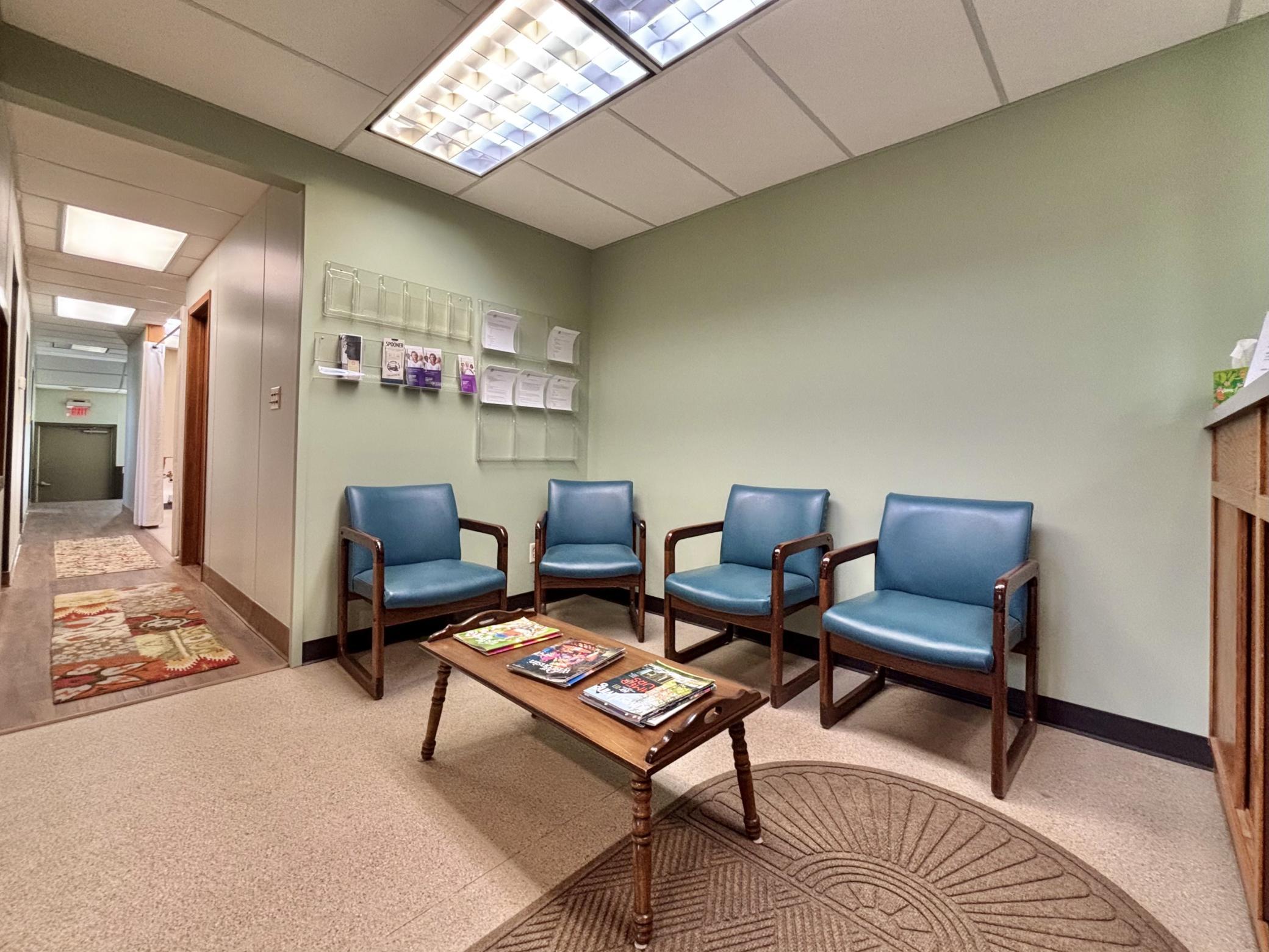 All interior here is newly painted in the reception area and new LVP planking runs down the hall and into the patient rooms.