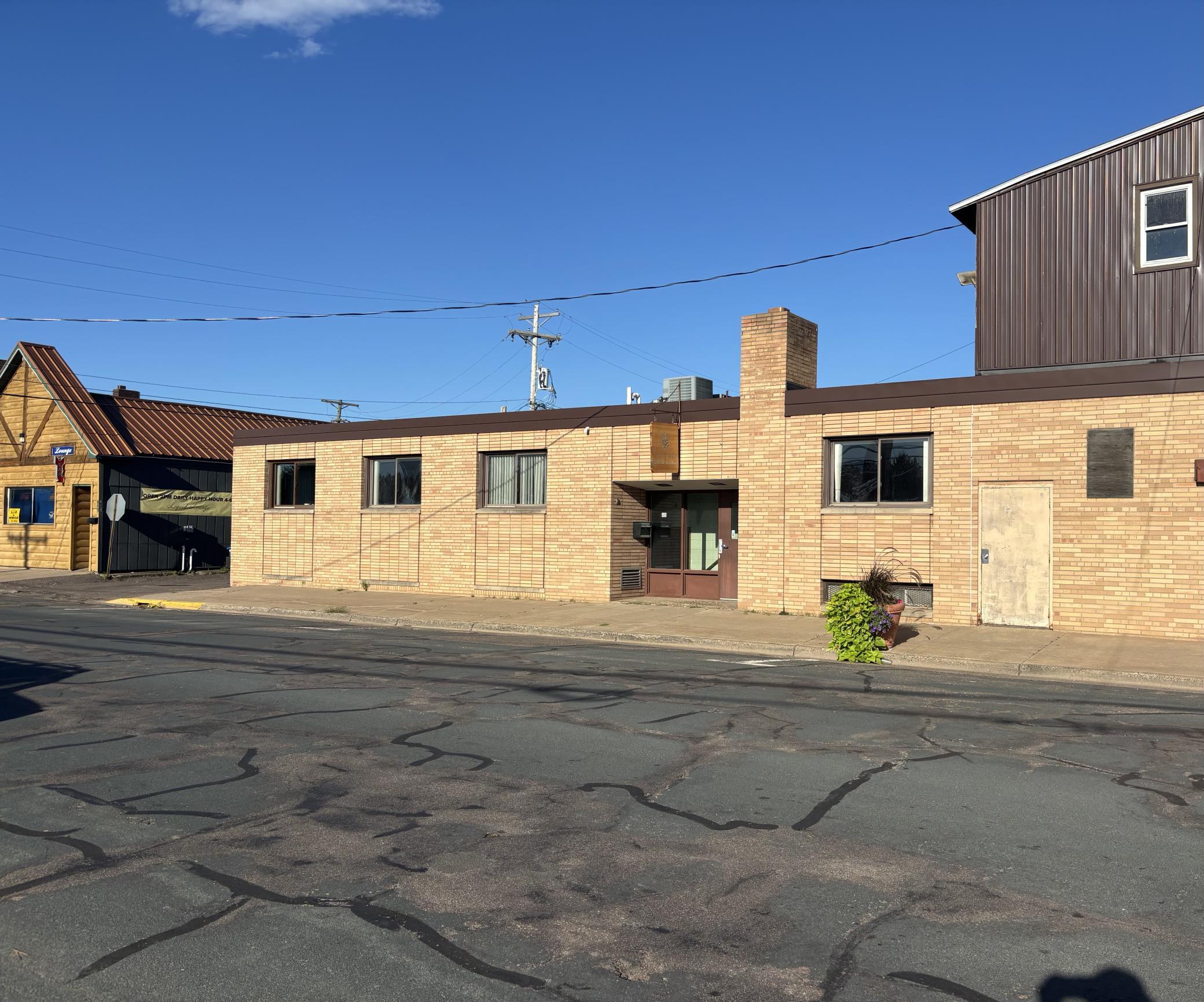 Location, Location, Location!!! Ready to go!!! This office space offers many options for use and lots of room for additional rental potential as well. Lower level is all usable too with good storage.