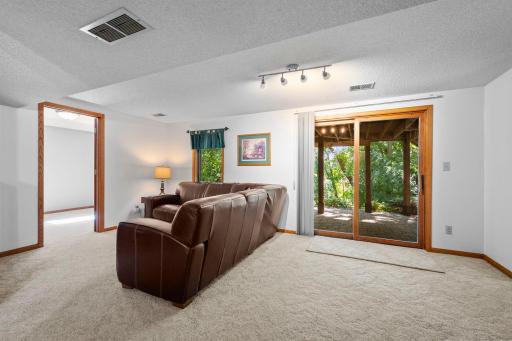 Walk-out design to large patio and backyard
