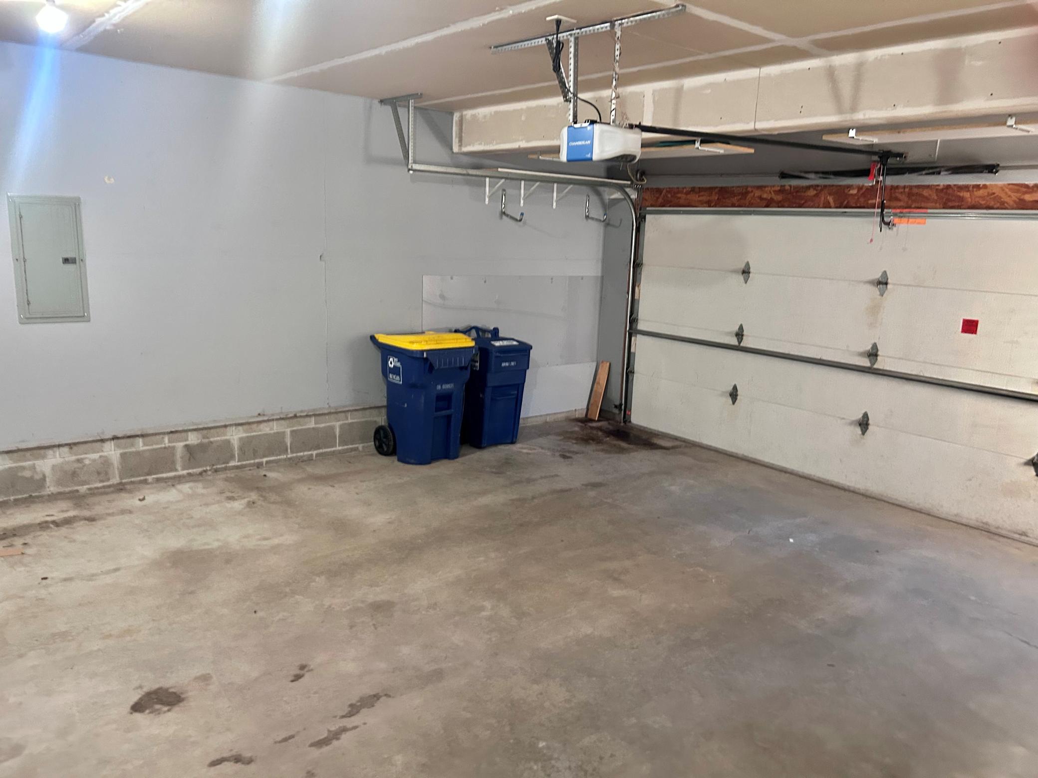 2-Car Garage with finished walls and sheetrocked ceiling