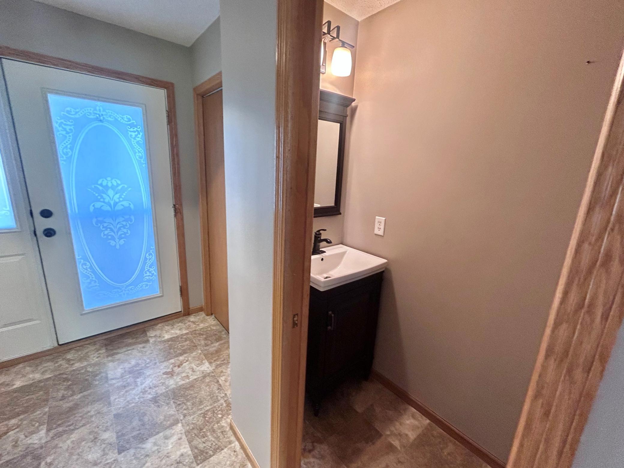 View of entry and half bath