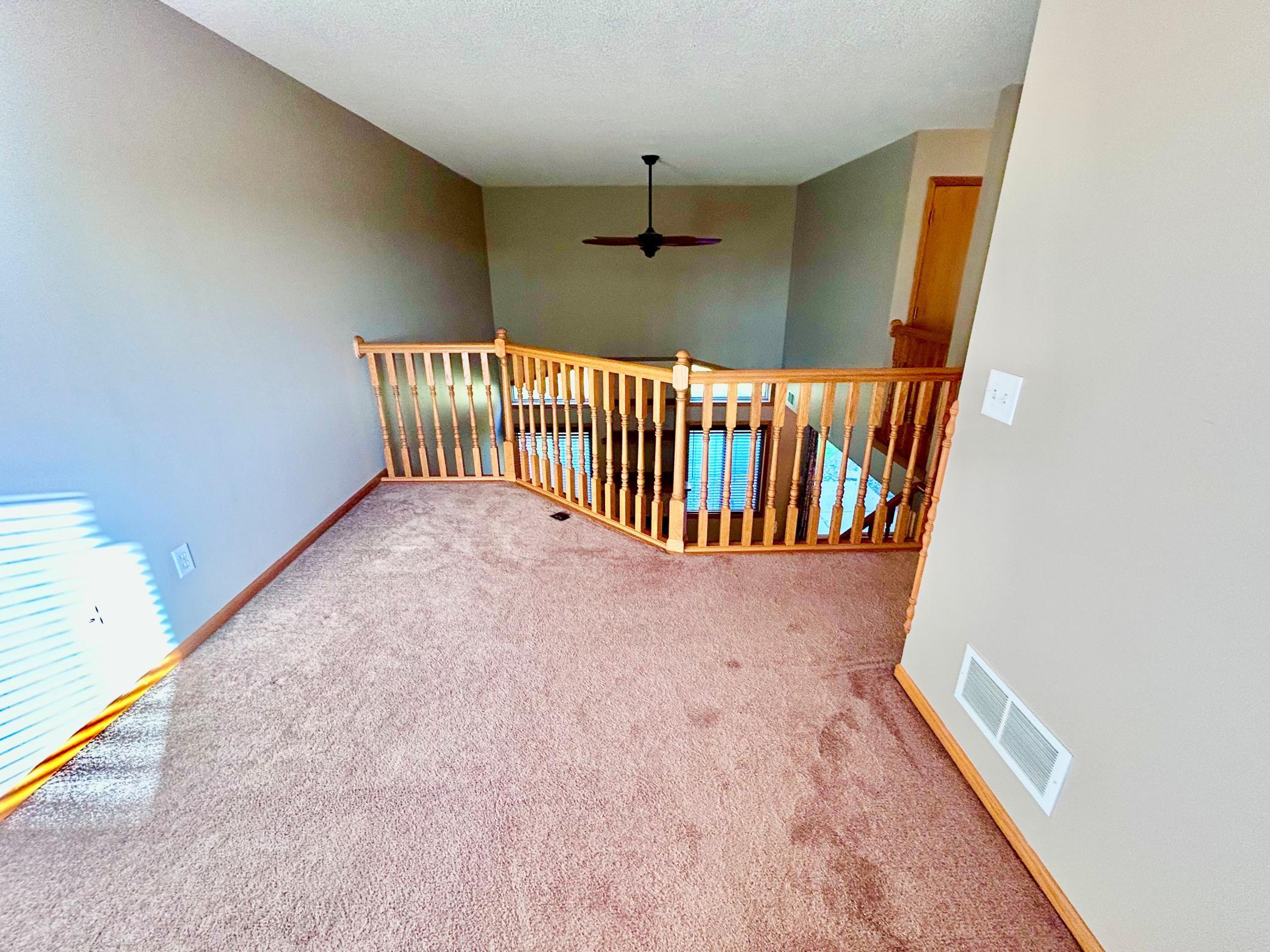 Loft area for an office, play area, or couches