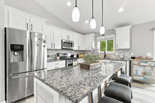 Beautiful Kitchen with a Functional Layout and Stainless Steel Appliances