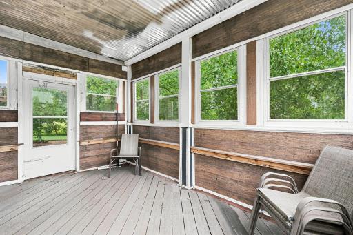 Relax and Unwind in the Inviting 3-Season Porch