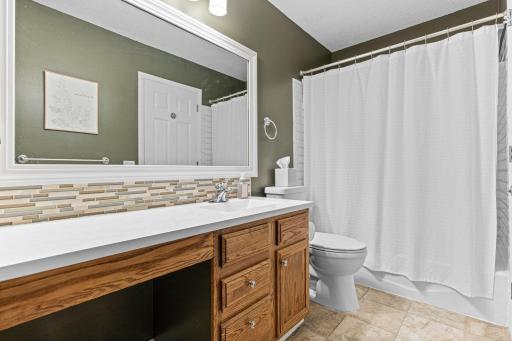 Direct access to tastefully updated full bathroom