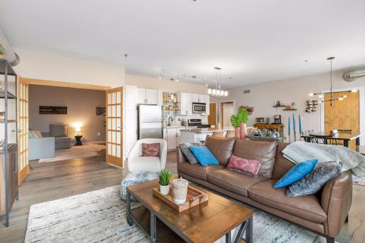 Comfortable furnishings, layered rugs, and stylish dÃ©cor create a welcoming space for relaxing or entertaining.