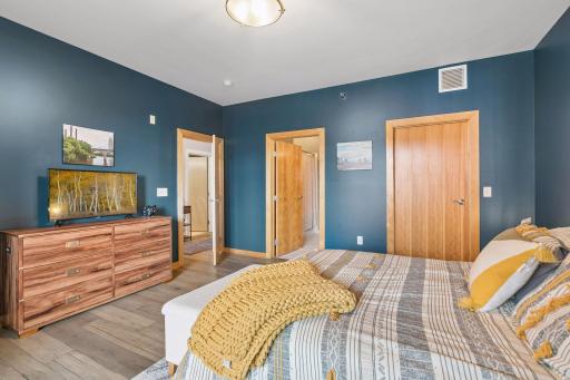 The primary bedroom features an en-suite bathroom.