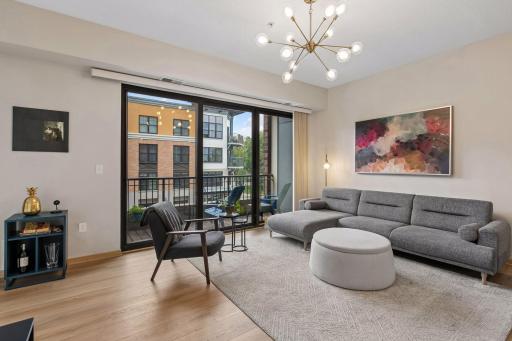 With an entire wall of glass, natural light pours into the living room from morning to evening. Even better, the windows look toward a quiet interior street rather than the activity of the surrounding businesses.