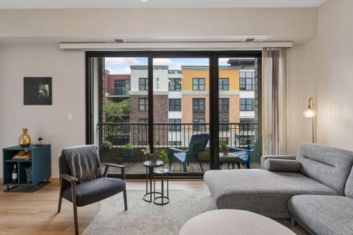 The living room opens directly to the balcony, creating an easy connection to the outdoors. Itâs a great spot for morning coffee, an evening drink or simply a little fresh air without leaving home.