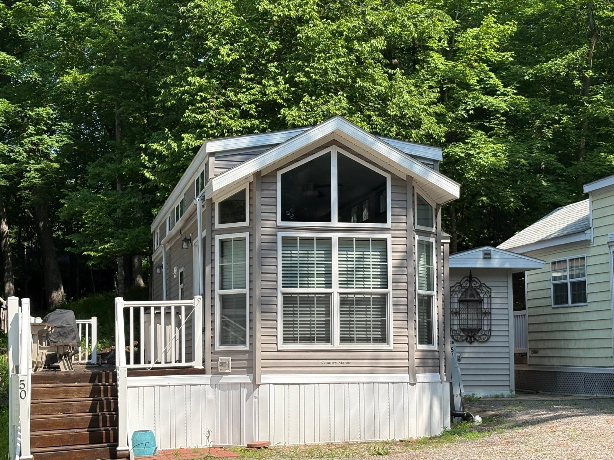 Welcome to seasonal living at its finest in the heart of Timberwoods Resort, on the shores of Lake Augusta.