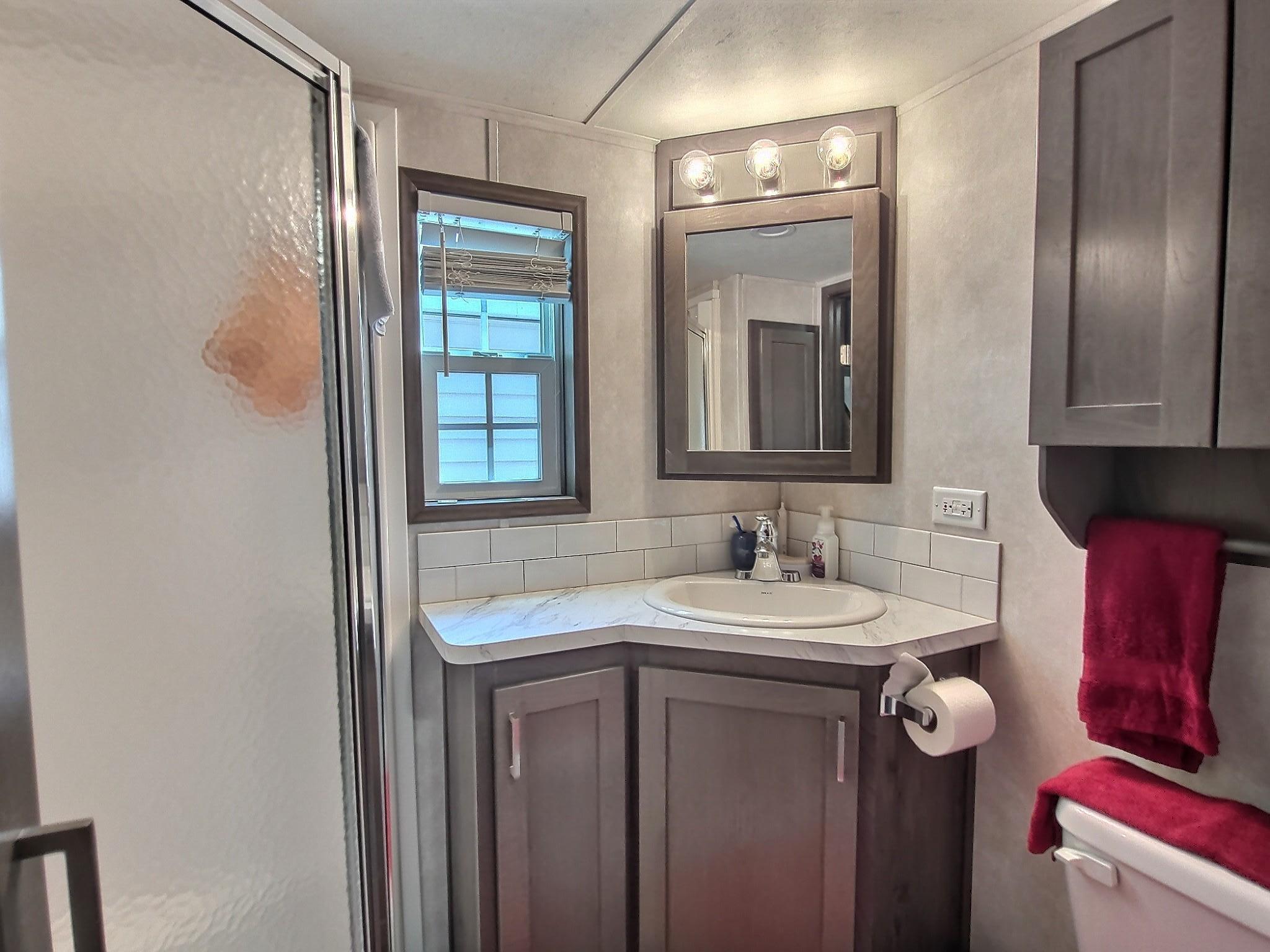 Here is the .75 bath located near the bedroom and just off the kitchen.