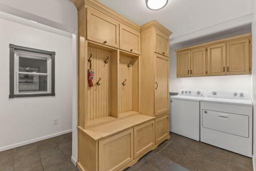 The laundry room is located near the garage entrance to the home.