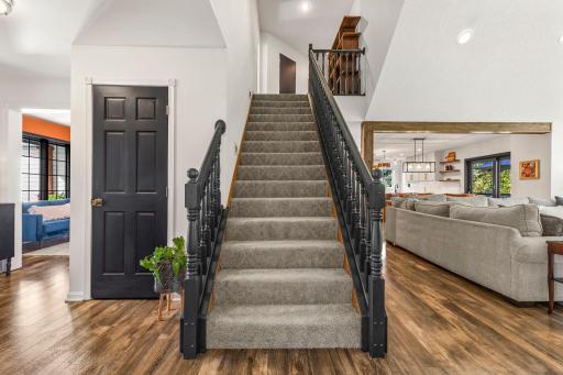 More bedrooms and a bathroom are located on the upper level.