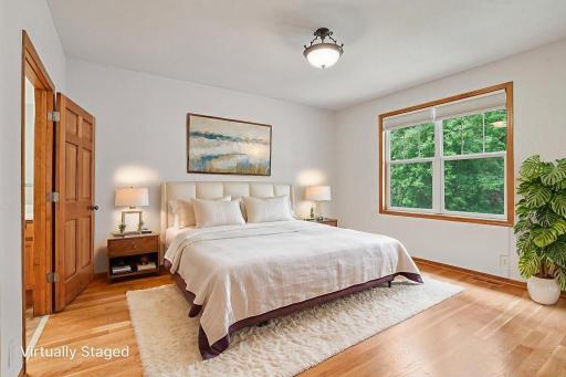 Primary bedroom has plenty of room for a King sized bed, two nightstands and two other dressers. .jpeg