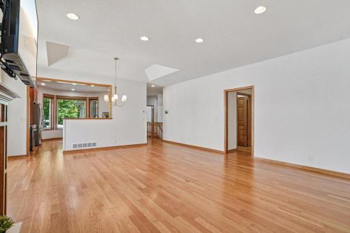 Living:Dining with primary bedroom on the right and looking down hall to main floor office and entry. .jpeg