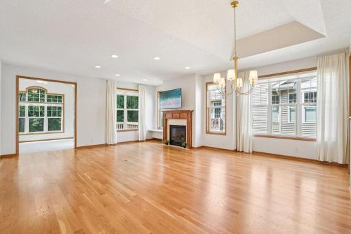 Beautiful real hardwood floors in an open concept space with coved ceilings. Stunning! .jpeg