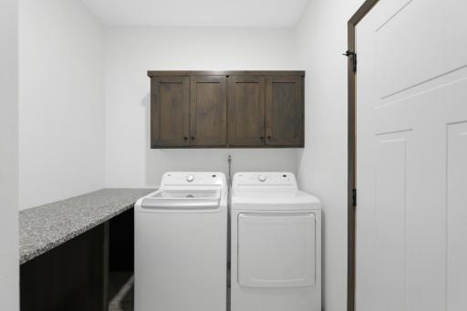Laundry room , and entrance to the garage.