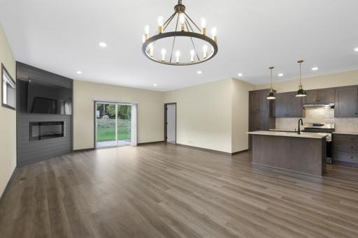Kitchen, dining room, and living room.