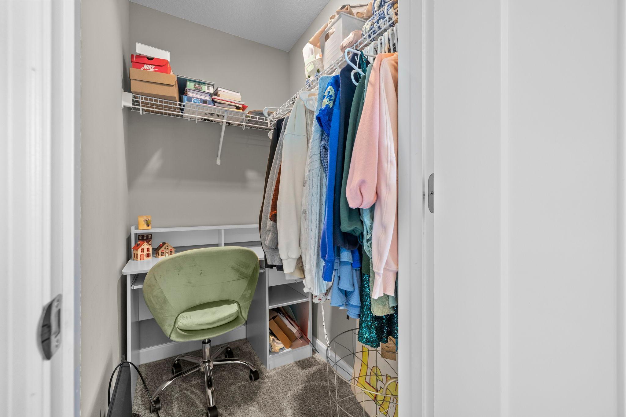Walk-in closet is large enough for a desk