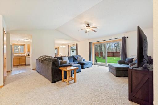 Living Room with sliding glass door to private fenced backyard