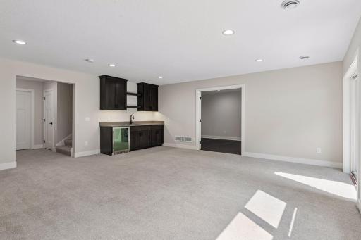 Lower level - Wet bar and excersize room entrance off the family room