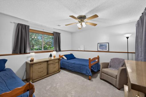 Spacious lower-level bedroom offers plenty of room for your preferred bed size and any additional large furniture.