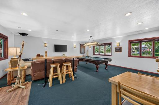 Huge amusement room provides plenty of room for games, gatherings and entertaining.