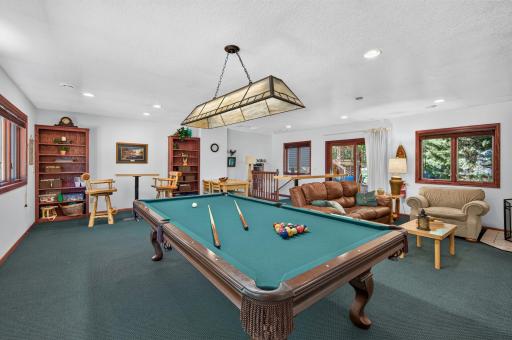 A fun and flexible gathering space with room for a pool table, seating and more.