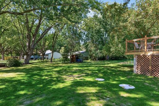 Enjoy 1.25 acres with a beautiful mix of open lawn, mature trees and peaceful surroundings.