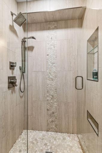 Amazing tile work in the step in shower