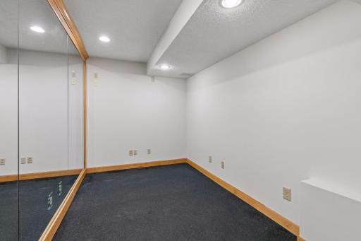 This flex room is the space to work out, craft or a kids playroom