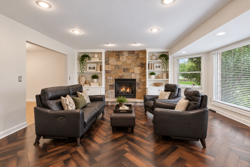 A cozy fireplace centers the main level living area
