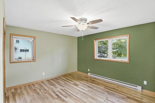 Primary Bedroom with oak floor